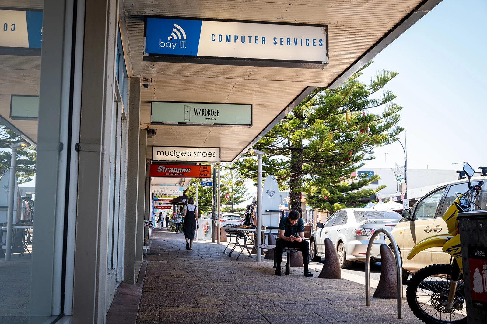 The Bay IT sign along the shopfronts on The Terrace, Ocean Grove